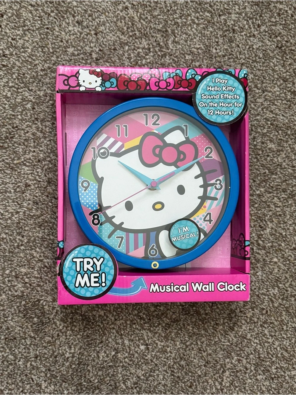 NIB Hello Kitty Blue Frame Pink Face Musical Wall Clock